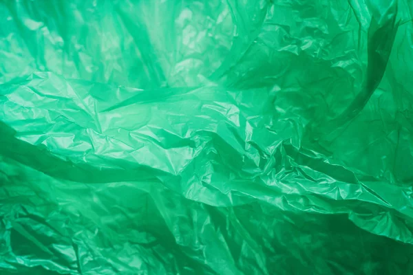 Green Crumpled Plastic Bag Texture Background Waste Recycle Concept Polyethylene — Stock Photo, Image
