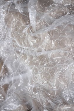 Temiz plastik torba doku arka plan. Atık geri dönüşüm konsepti. Buruşturulmuş polietilen ve selofan.