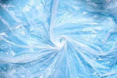 Berrak plastik torbadan girdap. Atık geri dönüşüm konsepti. Çevre Koruma. Polietilen arka plan dokusu.