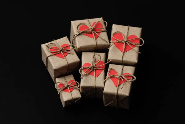 Set Gift Boxes Black Background Heart Cardboard Parcels Wrapped Craft — Stock Photo, Image
