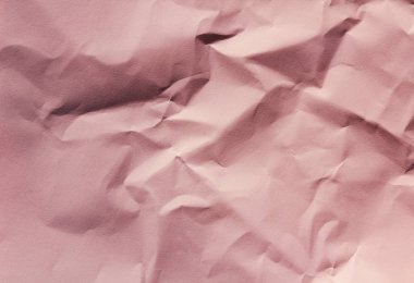 Buruşturulmuş pembe kağıt doku arka plan. Paketleme işlemi. Hediyelik eşya dükkanı. Dekoratif sarma.