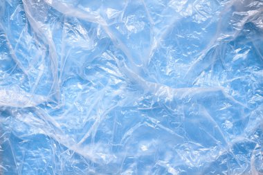 Temiz plastik torba doku arka plan. Atık geri dönüşüm konsepti. Buruşturulmuş polietilen ve selofan.