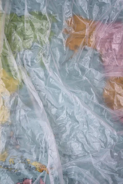 Doorzichtige Plastic Zak Textuur Achtergrond Aarde Kaart Afvalrecycling Concept Verkruimeld — Stockfoto