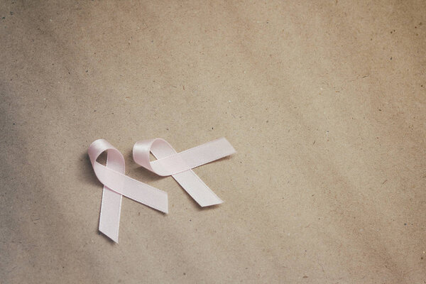 Pink ribbon. Symbol of breast cancer awareness. Health care conception. Preventive measures. October checking time. 