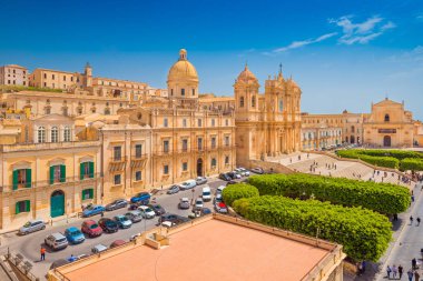 Beautiful city of Noto, Italian Baroque Capital. View of the Cathedral in the city center. Province of Syracuse, Sicily, Italy clipart