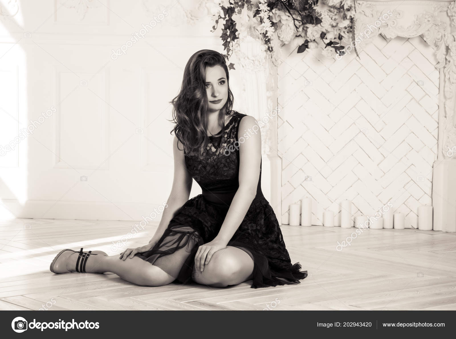Woman in Dress Sitting On Floor