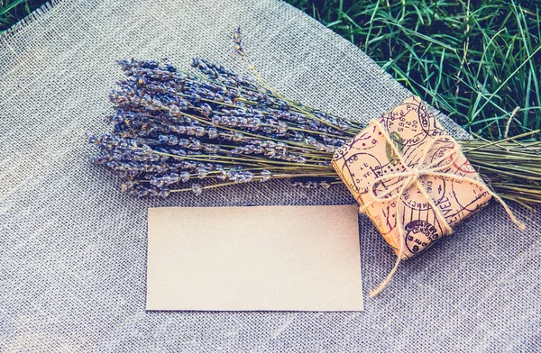 Lavender and romantic letter. Empty sheet of paper, lavender and gift box. Romantic concept. Copy space