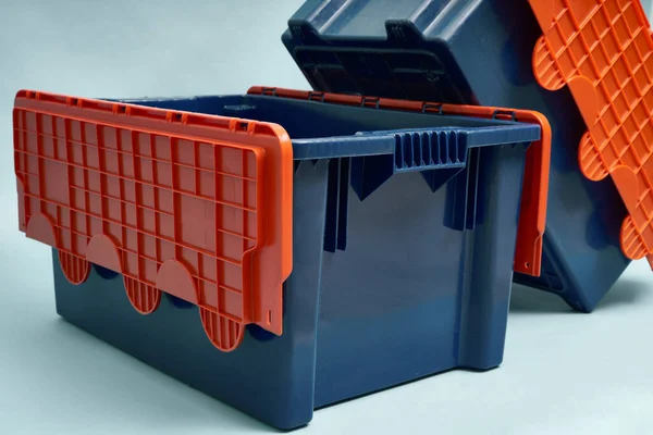 Plastic storage boxes. Boxes for the delivery of products. Orderly storage.