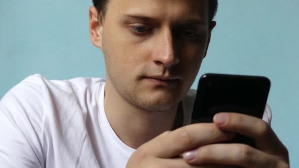 Caucasian Male Portrait Man Hands Scrolling Tapping Black Smartphone While — Stock Video