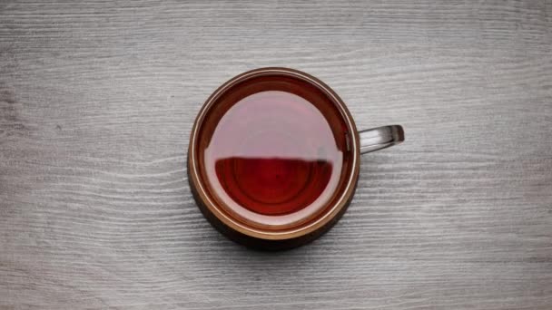 Drinking Black Tea Teacup White Background Stop Motion Time Lapse — Stock Video