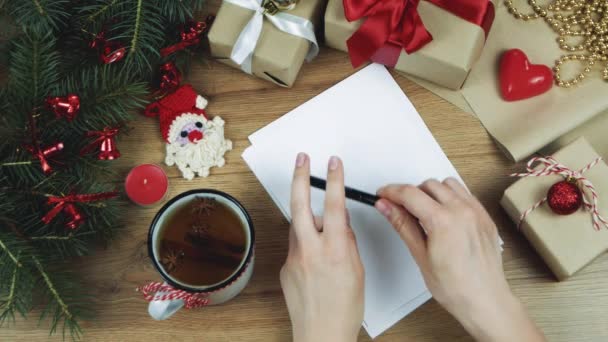 Vrouw Handen Schrijven Nieuw Jaar Lijst Doen Wit Papier Blad — Stockvideo