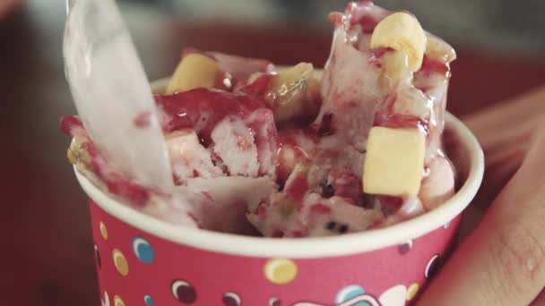 Ice Cream Roll Raspberries Kiwi Marshmallows Plastic Spoon Gaining Ice — Stock Video