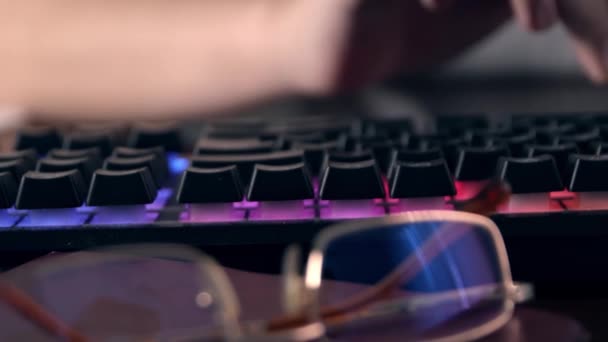 Close Shot Woman Hand Typing Computer Keyboard Multi Colored Illumination — Stock Video