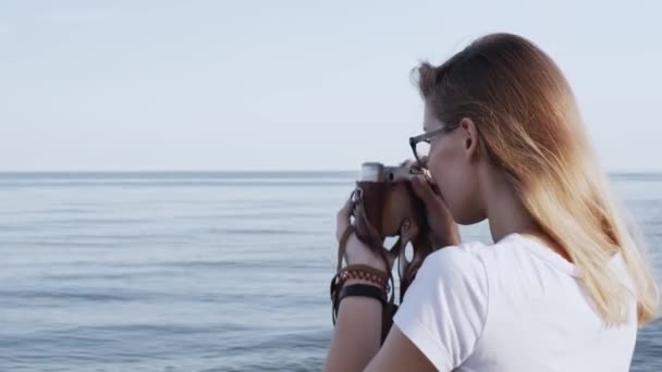 Close Woman Taking Photo Using Retro Camera Photographing Beautiful Sea — Stock Video