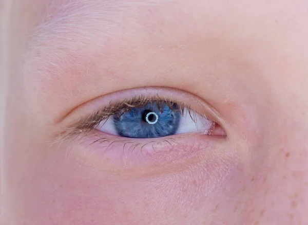 One eye of a teenager macro close-up — Stock Photo, Image