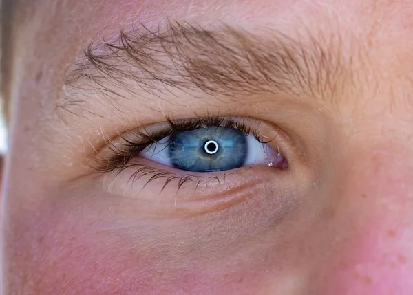 One eye of a teenager macro close-up — Stock Photo, Image