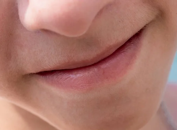 Lips natural close-up of teen boy front view — Stok Foto