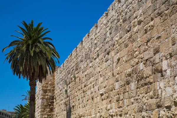 Jerusalem, Palestine, Israel-August 14, 2015-Ancient wall and pa