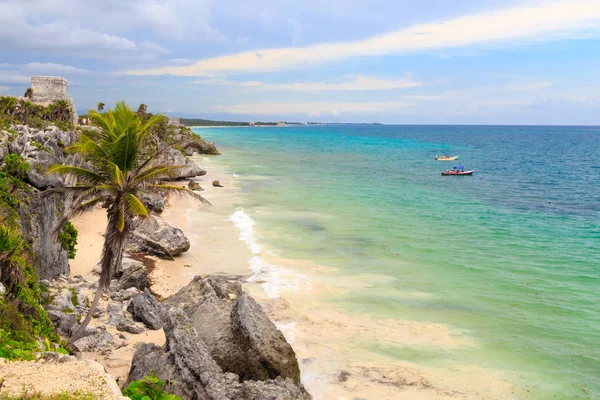 Palm trees, sea, sun, beach. Caribbean sea, Tulum, Yucatan. Mexi