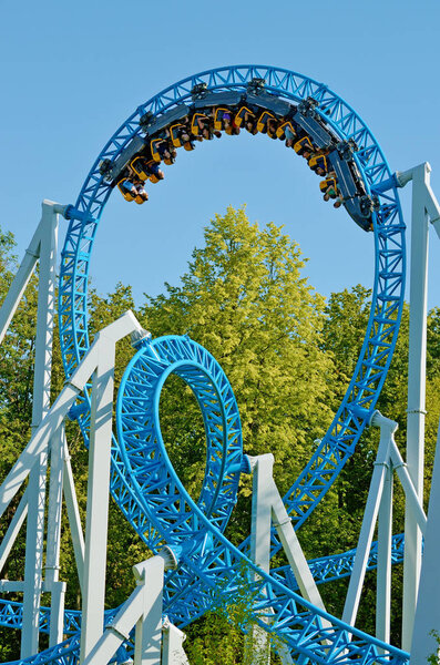 Saint-Petersburg.Russia. July.12.2018. Kresovsky island.Divo island Park.A popular attraction is the Russian roller coaster.It is a railway system of special design.Passengers traveling in railcar at high speed.