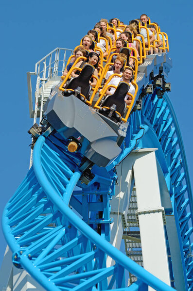 Saint-Petersburg.Russia. July.08.2018. Kresovsky island.Divo island Park.A popular attraction is the Russian roller coaster.It is a railway system of special design.Passengers traveling in railcar at high speed.