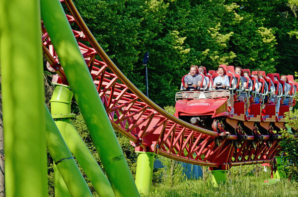 Санкт-Петербург. Россия. Июль 2018г. Kresovsky island.Divo ostrov Park.A popular attraction is the Russian roller coaster.It is a railway system of special design.Passengers traveling in railcar at high speed
.