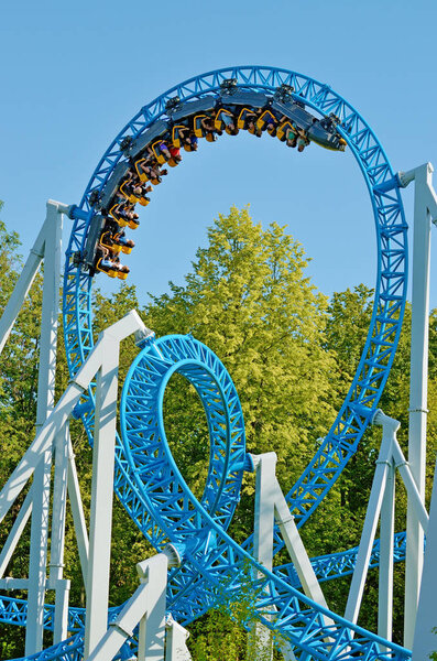 Saint-Petersburg.Russia. July.08.2018. Kresovsky island.Divo island Park.A popular attraction is the Russian roller coaster.It is a railway system of special design.Passengers traveling in railcar at high speed.