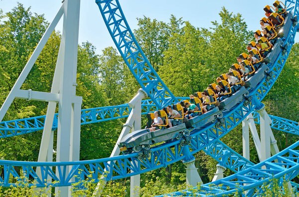 Saint-Petersburg.Russia. July.15.2018. Kresovsky island.Divo island Park.A popular attraction is the Russian roller coaster.It is a railway system of special design.Passengers traveling in railcar at high speed.