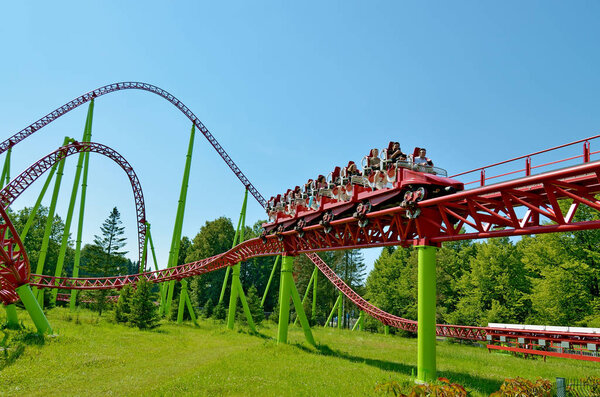 Санкт-Петербург. Россия. 15 июля 2018г. Kresovsky island.Divo ostrov Park.A popular attraction is the Russian roller coaster.It is a railway system of special design.Passengers traveling in railcar at high speed
.