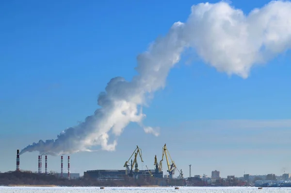 Industrial area of the city.Smoke from pipes.