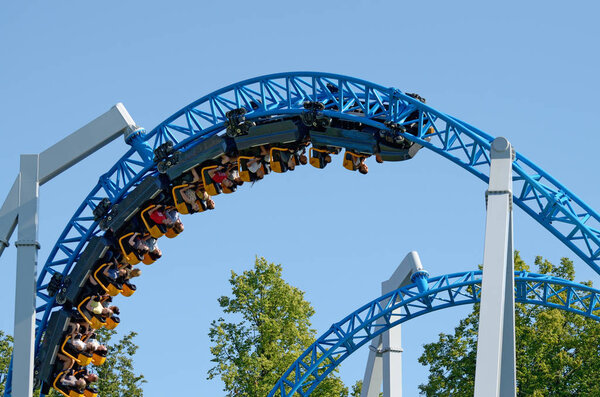 Saint-Petersburg.Russia. July.12.2018. Kresovsky island.Divo island Park.A popular attraction is the Russian roller coaster.It is a railway system of special design.Passengers traveling in railcar at high speed.