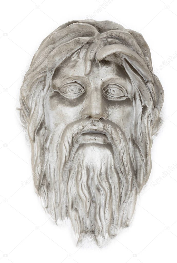 The face of a bearded man from the ancient era of Greece .