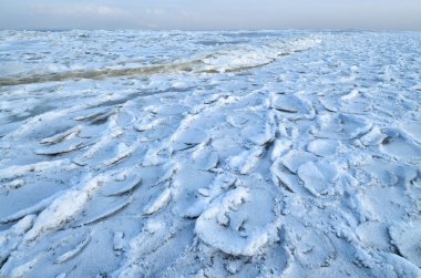 Bay buz ile kaplıdır. Frost kar güzel bir doku oluşmuş.