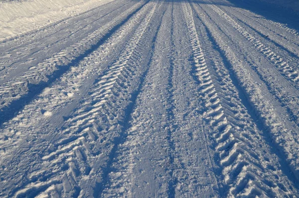 Car tire tread on snow. — Stock Photo, Image