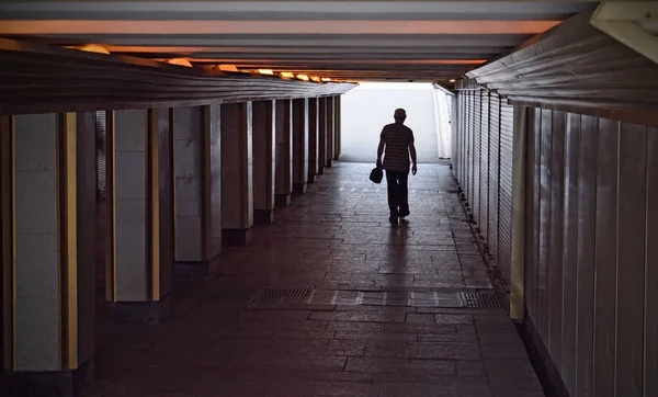 Man Goes Underpass Safe Way Cross Roadway Stock Image