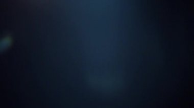 mavi enerji ışık parlama arka plan siyah metin veya logo için kopya alanı ile. Gelecek modern, animasyon duvar kağıdı teknoloji. 3D animasyon render 4k video