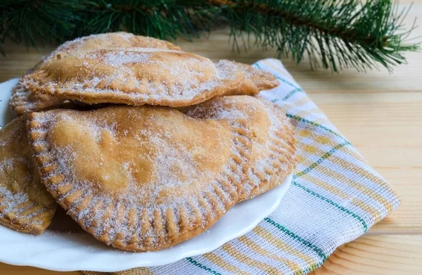 Trucha de batata, typical Christmas sweet in Canary Islands, Spain. Canary pastries traditionally filled with sweet potatoes paste or cabell d\'angel.