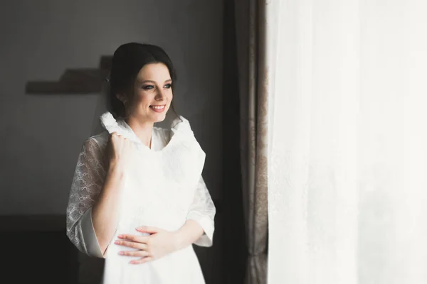 Portrait of beautiful bride with fashion veil at wedding morning — Stok Foto