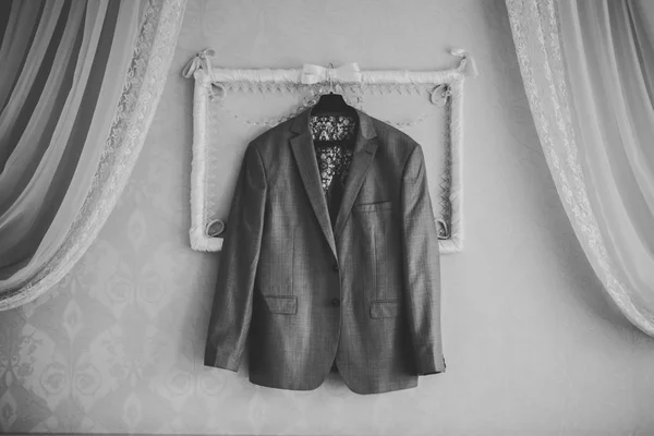 Stylish groom suit in dressing room indoors