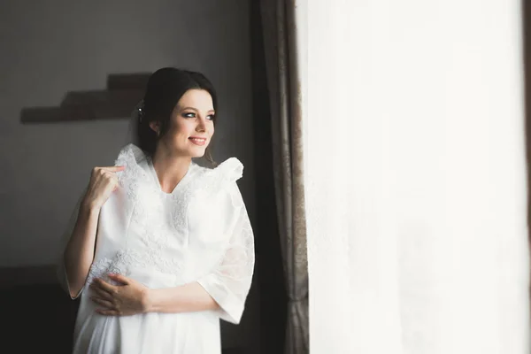 Portrait of beautiful bride with fashion veil at wedding morning — Stok Foto