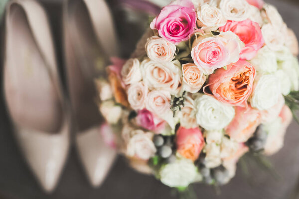 Wonderful luxury wedding bouquet of different flowers