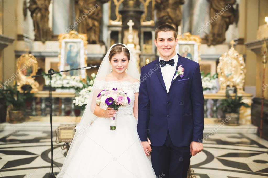 Wedding couple bide and groom get married in a church