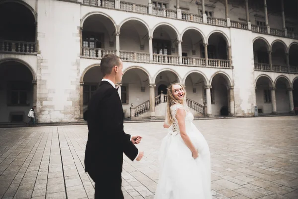 Wedding couple bride and groom holding hands — Stock Photo, Image