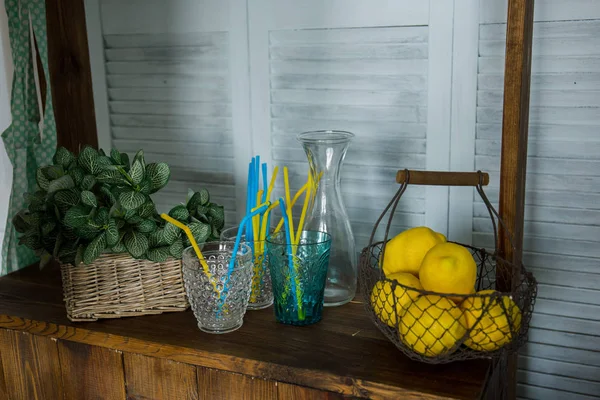 Basket with yellow lemons on the stand — Stock Photo, Image
