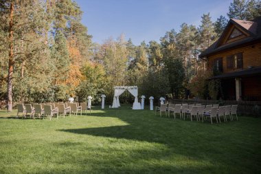 arch for the wedding ceremony in fall in the park