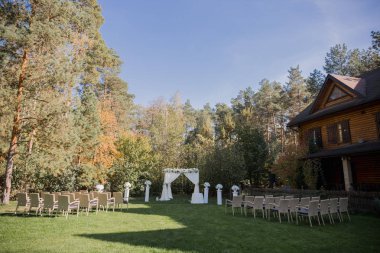 arch for the wedding ceremony in fall in the park