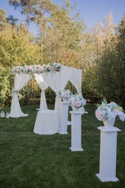 arch for the wedding ceremony in fall in the park
