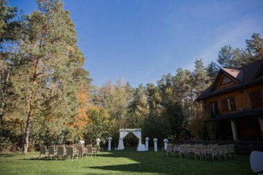 arch for the wedding ceremony in fall in the park