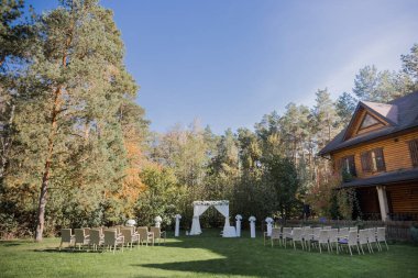 arch for the wedding ceremony in fall in the park