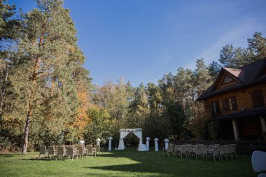arch for the wedding ceremony in fall in the park
